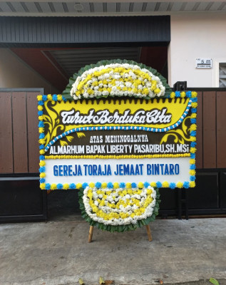 Papan Bunga Duka di Mogolaing